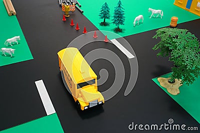 Driver Education Toy School Bus on Dangerous Road