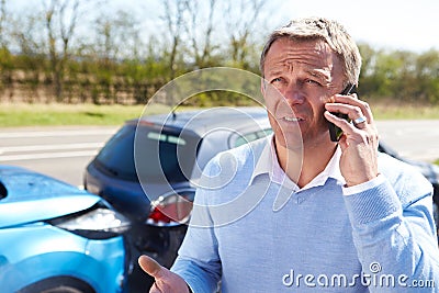 Driver Making Phone Call After Traffic Accident