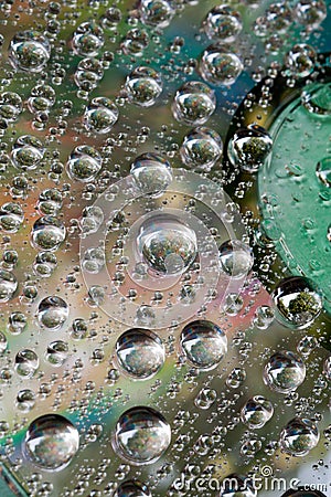 Drop of water on CD and DVD