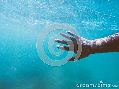 Drowning man hand