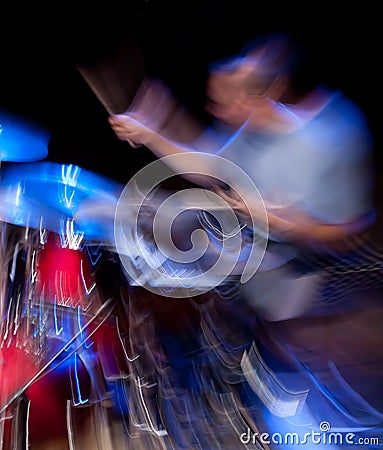 Drummer in action, motion blur