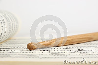 Drumstick and Music Sheet