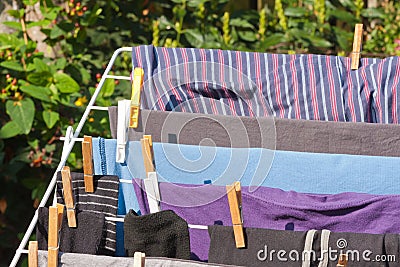 Drying frame with clothes in the garden