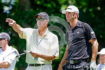 Dustin Johnson and caddy Joe LaCava