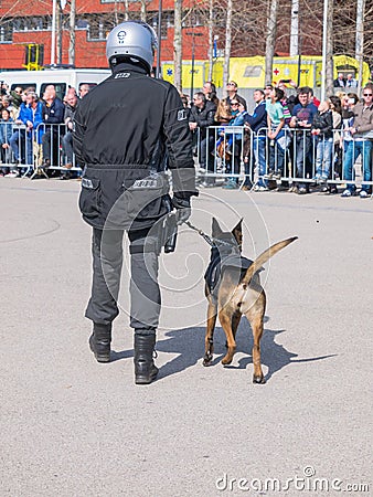 Dutch SWAT team member and dog in action