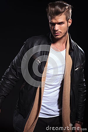Dynamic picture of a young manin leather jacket