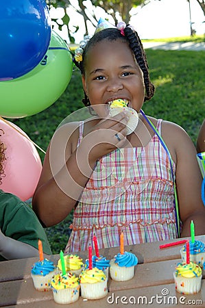 Eating cupcake birthday party