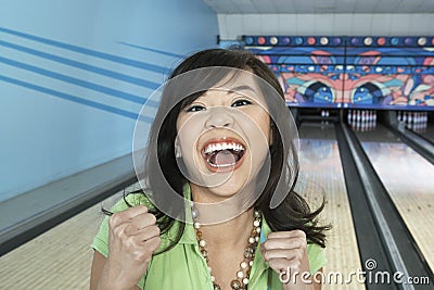 Ecstatic Female At Bowling Alley