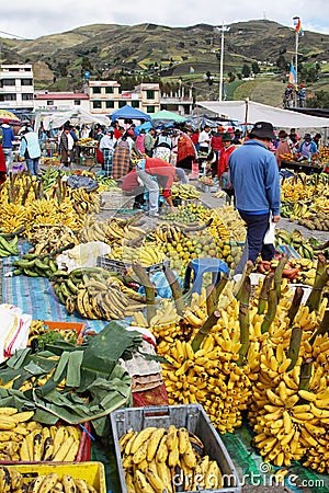 Ecuadorian ethnic people with indigenous clothes in a rural Saturday market in Zumbahua village, Ecuador.