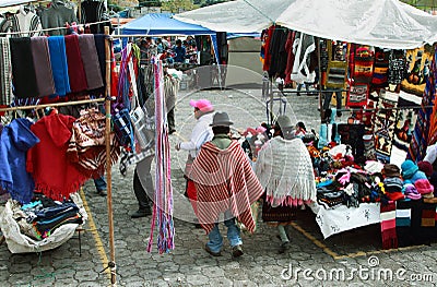 Ecuadorian ethnic people with indigenous clothes in a rural Saturday market in Zumbahua village, Ecuador.