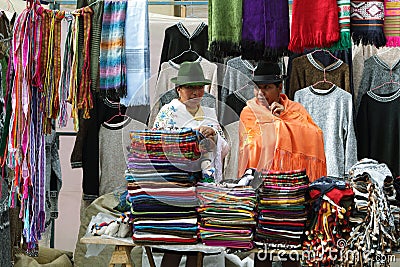 Ecuadorian ethnic women with indigenous clothes in a rural Saturday market in Zumbahua village, Ecuador.