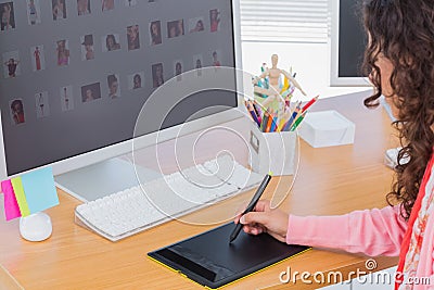 Editor using graphics tablet to edit