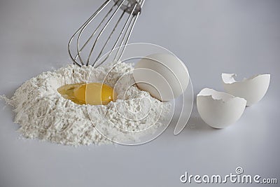 Egg, Egg shell and whisk on white background