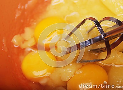 Eggs and sugar in mixing bowl prepare for bake