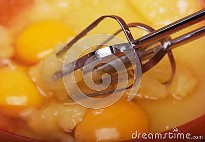 Eggs and sugar in mixing bowl prepare for bake