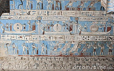 Egyptian hieroglyphic paintings on a temple wall