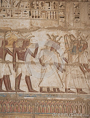 Egyptian hieroglyphics on a temple wall