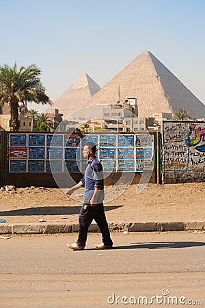 Egyptian Man Walking Giza Pyramids
