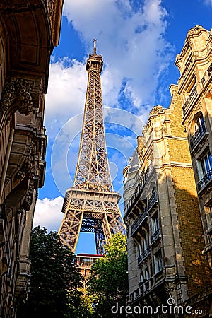 Eiffel Tower above Old Parisian Buildings in Paris