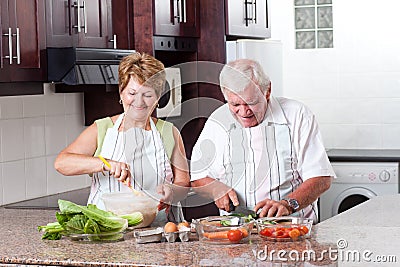 Elderly couple cooking