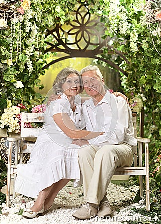 Elderly couple on wooden porch