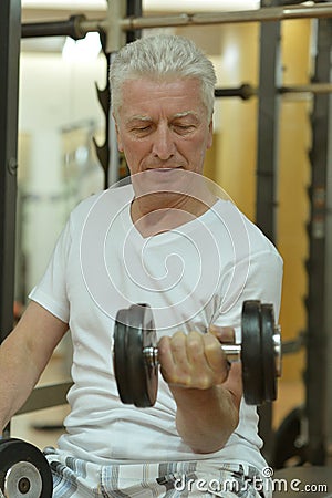 Elderly man in a gym