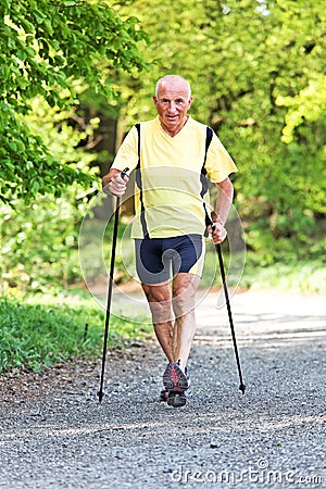 Elderly man with Nordic walking