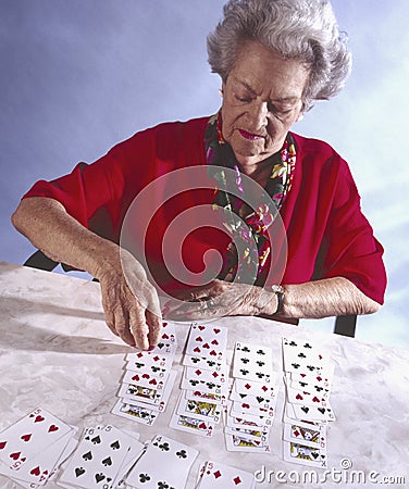 elderly-woman-playing-solitaire-5938066.jpg