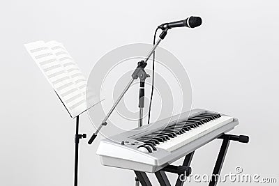 Electric piano, microphone and music stand