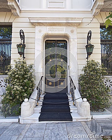 Elegant house door and flower pots