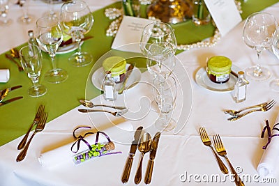 Elegant table set in lilac and green for wedding or event party