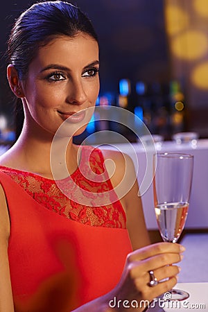 Elegant woman with champagne flute