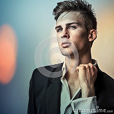 Elegant young handsome man..Color digital painted image portrait of men face.