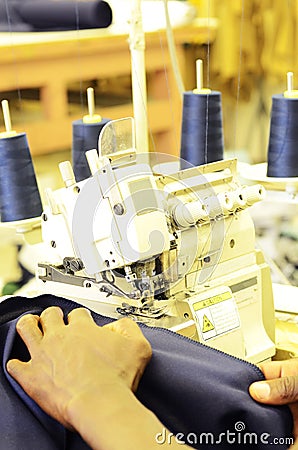Employee working on an industrial sewing machine