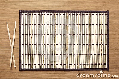 Empty bamboo mat on table