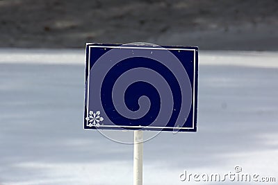 Empty Blue Sign on the Ski Slopes