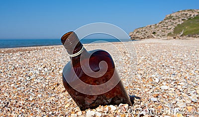 Empty bottle on beach