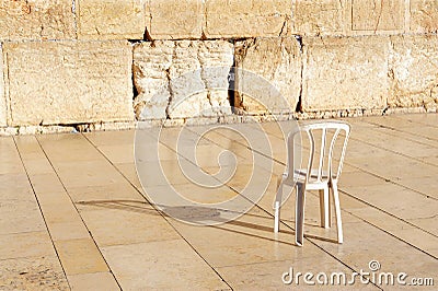 An empty chair at the Western Wall Jerusalem