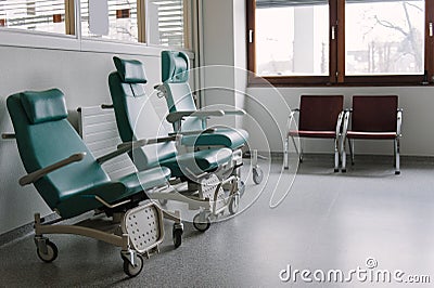 Empty chairs in a hospital.