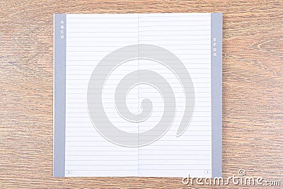 Empty contact notebook on wooden table