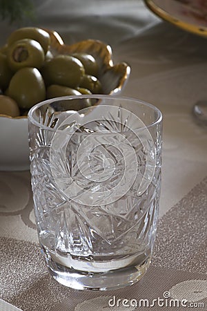 Empty crystal shot glass on a table