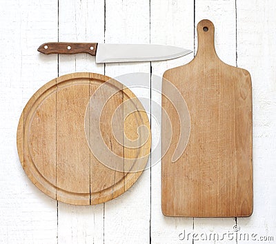 Empty cutting board on white planks food background