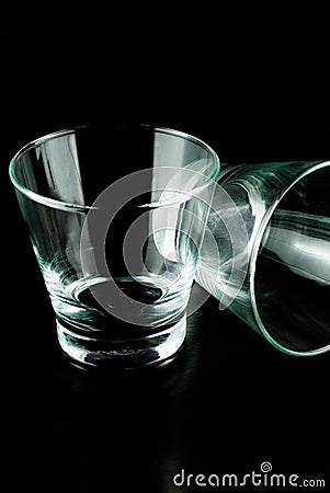 Empty glasses on a black background