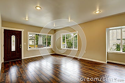 Empty house interior. Spacious living room with new hardwood flo