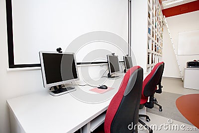 Empty library, computers, books