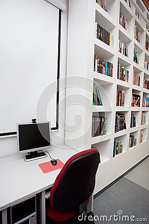 Empty library, computers, books