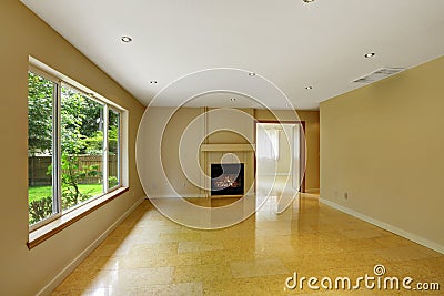 Empty living room with shiny marble tile floor