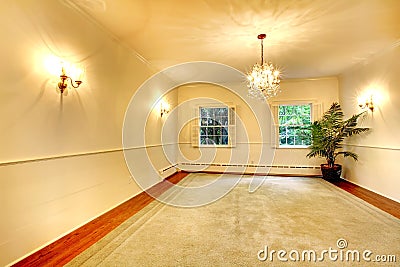 Empty luxury antique large dining room interior with white walls.