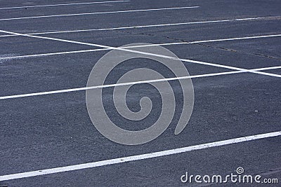 Empty parking lot with white lines