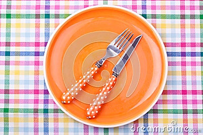 Empty plate,fork and knife